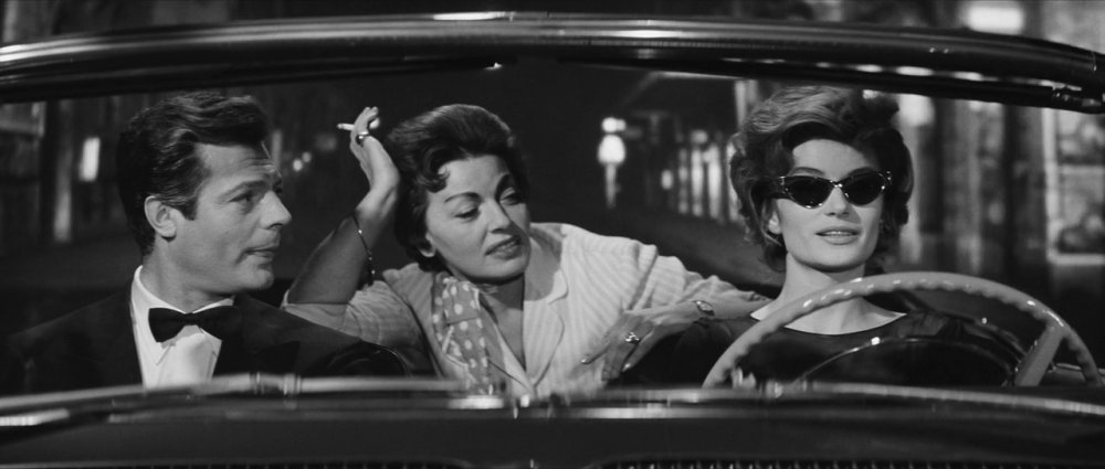 1719707479_marcello_mastroianni_adriana_moneta_anouk_aimee_-_la_dolce_vita_1960_fellini.jpg