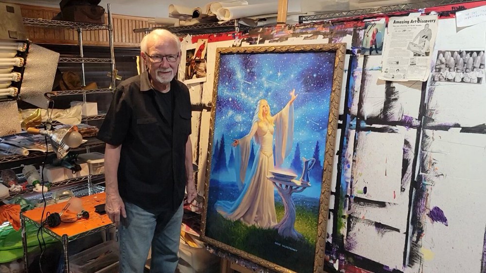 1730670481_greg_hildebrandt_with_his_painting_the_ring_of_galadriel_-_may_2024.jpg